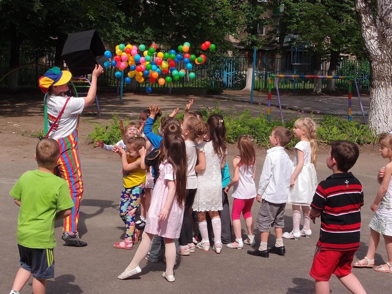Children enjoying an outdoor party celebration