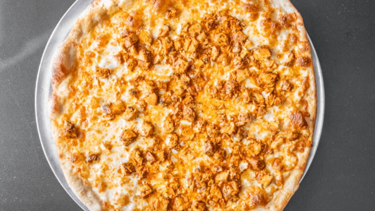 Classic cheese pizza with golden crust